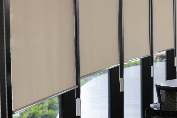 istock A row of white blinds with black handles 2153651812