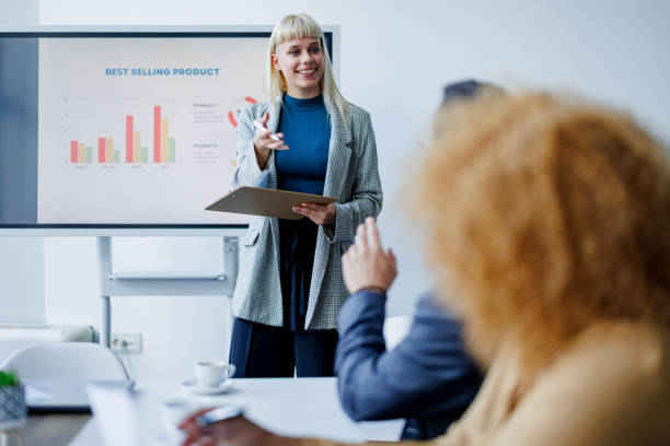 istock Woman presenting graph during a meeting 2153656826