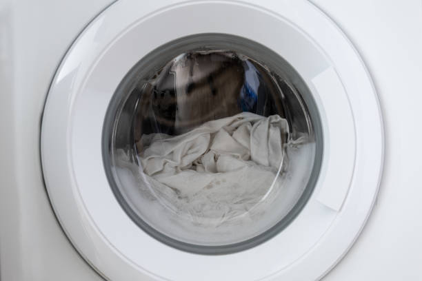 istock Close-up laundry running washing machine at home 2153660659