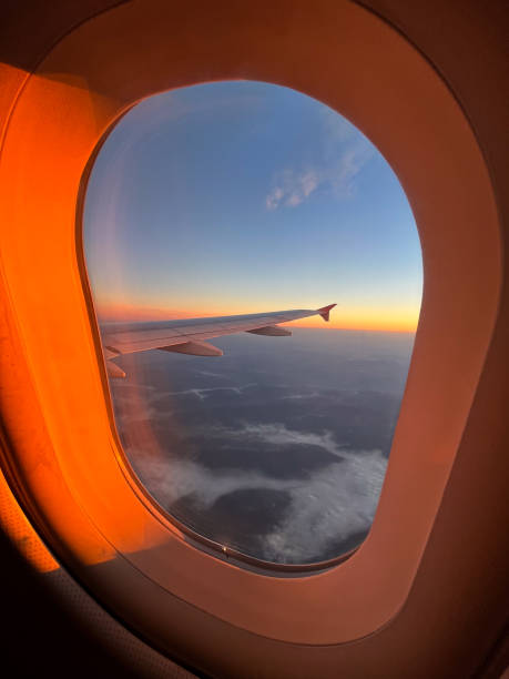 istock Splendid sunrise as seen through an airplane window 2153660687