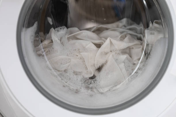 istock Close-up laundry running washing machine at home 2153660717