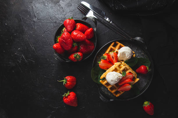 istock Belgian waffles with strawberries and ice cream 2153661371