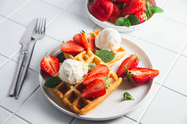 istock Belgian waffles with strawberries and ice cream 2153661393