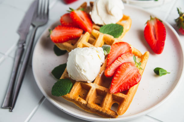 istock Belgian waffles with strawberries and ice cream 2153661402