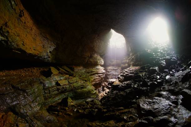 istock Light Beams illuminating the Stephens Gap  Cave Alabama 2153663532