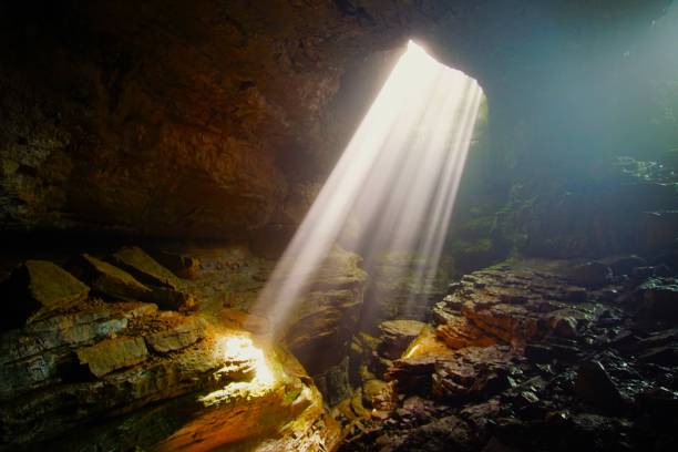 istock Light Beams illuminating the Stephens Gap  Cave Alabama 2153663589