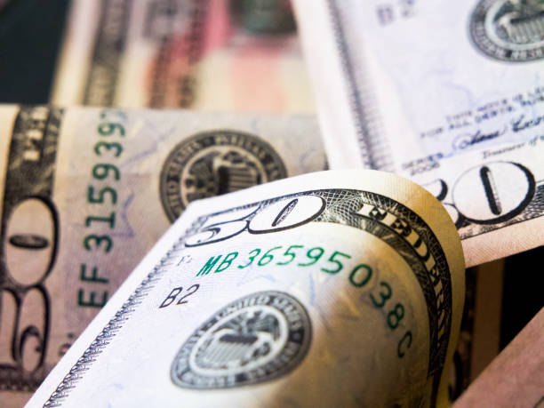istock Banking Visual. Detailed US dollar bills, suitable for finance-related content. 2153664093