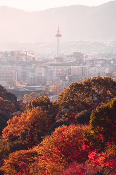 istock Autumn Cityscape with Tower and Mountain Background 2153664367