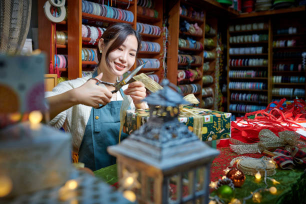 istock One Asia Female Craftsperson Wrapping Gift Box 2153664777