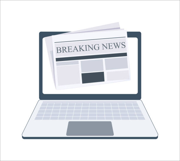 istock Breaking News newspaper on laptop screen. Black and white newspaper layout. 2153664840