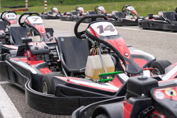 istock Red black go-karts on the side of a track 2153669257