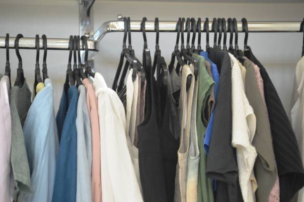 istock clothes in a store on the shelves 2153669824