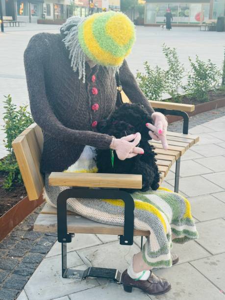 istock Dummy Lady sits in garden to make the birds afraid. 2153671357