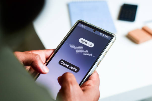 istock Man using mobile applications for voice cloning. Cyber crime concept. Selective focus. 2153672112