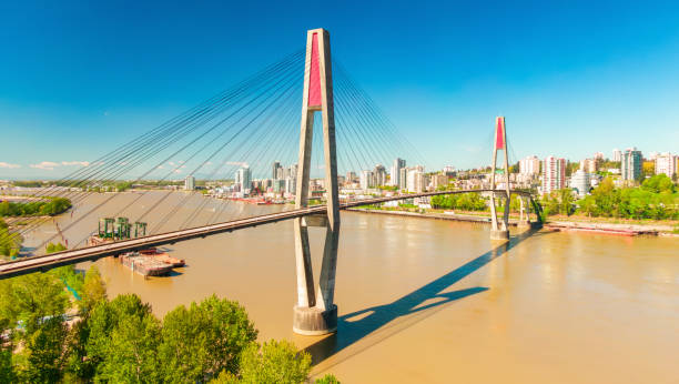 istock Bridge over river in Surrey to New Westminster. Sunny Day. 2153674852