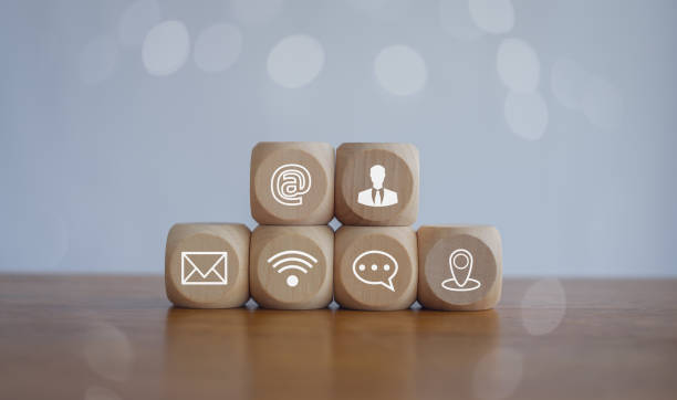 istock Customer support hotline Contact us people connection.Website page contact us or e-mail marketing concept,  Chat message icons. address,call phone, address, Label wood with the email. 2153677096