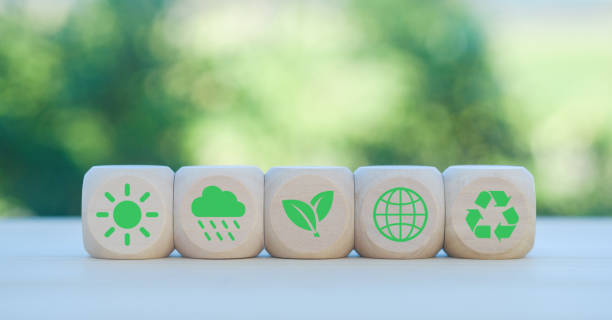 istock environment Earth concept. Net zero greenhouse gas emissions target. Climate neutral long term strategy. wooden cubes with decarbonization icon and green icon. Green banner. 2153677098