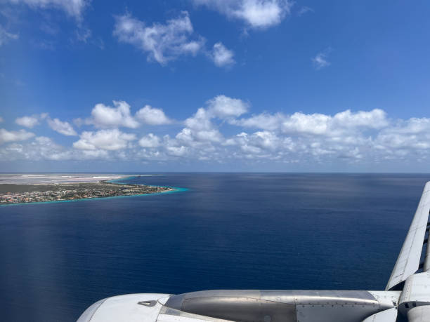 istock Landing in a plane over open ocean in Bonaire, Caribbean Netherlands 2153680512