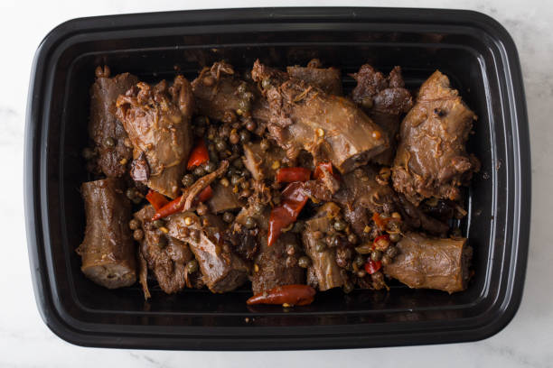 istock Chinese take out food spicy duck necks in a container 2153682645