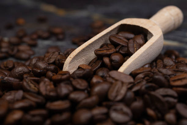 A harmonious blend of roasted coffee beans on a sophisticated marble background, evoking a feeling of decadence.