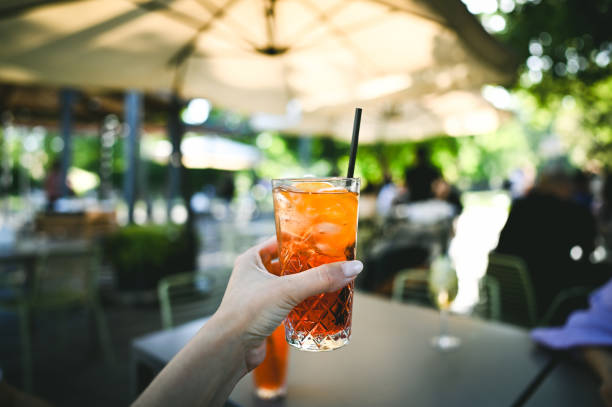 istock Woman drinking cocktail close up. 2153687372