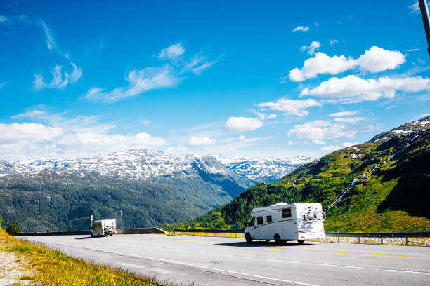 istock Two motorhomes on Norwegian mountain roads 2153688485