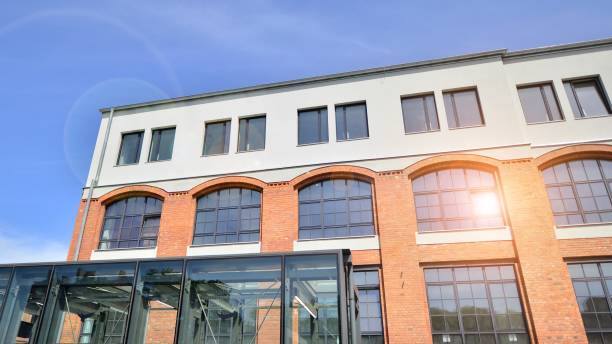 istock Modern office building with white metallic panel facade and windows. 2153688814