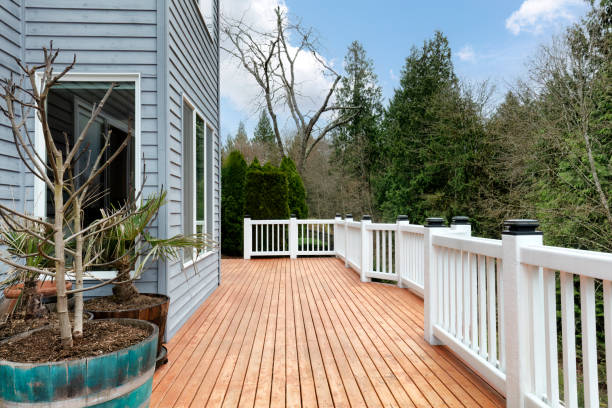 istock Freshly stain large home walk out cedar wood deck patio during early spring 2153689705