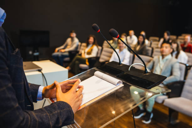 istock CEO having speech on press conference in convention center. 2153690358