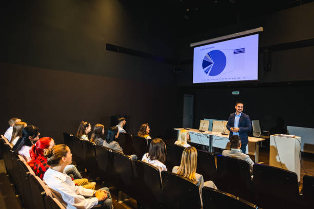 istock Male CEO having speech on press conference in convention center. 2153690389