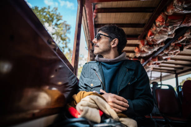 Mature man looking at view during on a ferry ride
