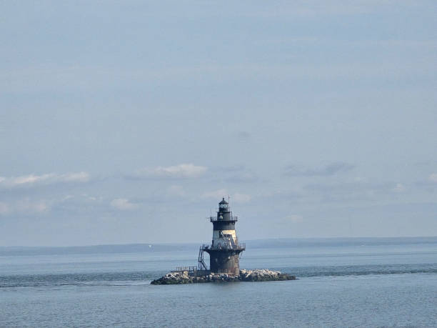 istock Lighthouse in the sea 2153696099