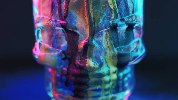 istock Neon skeleton glitter paint skull glass cranium 2153696228