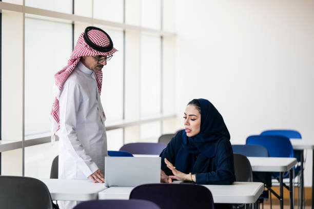 istock Academic coworkers discussing ideas in university study hall 2153696320