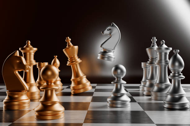 istock Gold and silver chess pieces on a board, with a knight piece in mid-air.3d rendering 2153707614