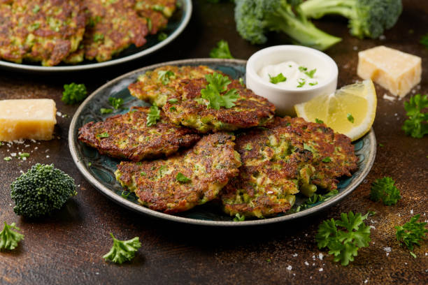 istock Fried Broccoli fritters or pancakes with parmesan and mozzarella cheese 2153707767