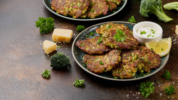 istock Fried Broccoli fritters or pancakes with parmesan and mozzarella cheese 2153707818