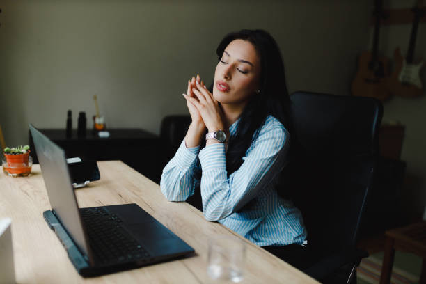 istock Businesswoman using a laptop and working remotely 2153708817