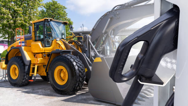 istock Electric construction machines with charging station 2153711034