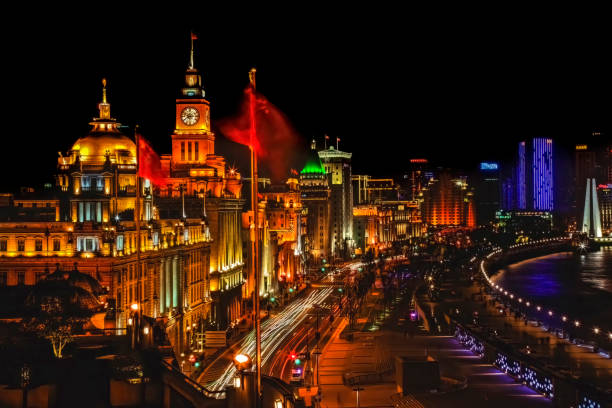 istock Shanghai Bund at Night China Flags Cars 2153711273
