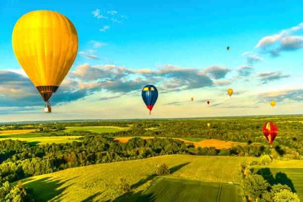 istock hot air balloons over rural landscape 2153717892