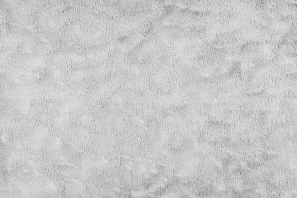 istock Texture of fluffy white upholstery fabric or cloth. Texture of artificial fur textile material. 2153726502