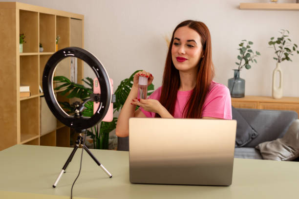 istock Content creator demonstrating beauty products online 2153726819