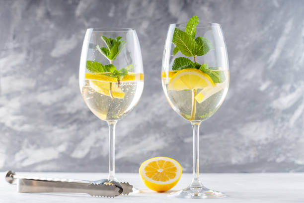 istock Refreshing Hugo Spritz Cocktail with Elderflower Cordial and Sparkling Wine in Glasses on Concrete 2153730382