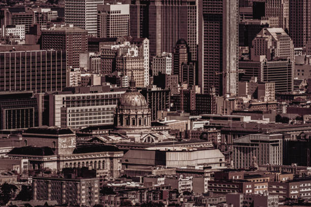 Sepia-toned cityscape of San Francisco, dominated by the majestic City Hall.