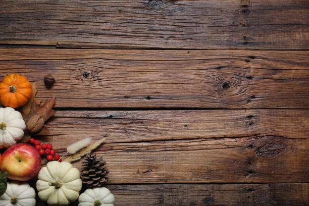istock Thanksgiving day. Flat lay composition with pumpkins on wooden table, space for text 2153733184