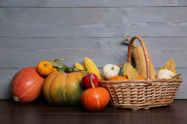 istock Happy Thanksgiving day. Beautiful composition with pumpkins on wooden table 2153733208