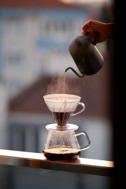 istock Brewing coffee on the balcony at sunrise 2153734534