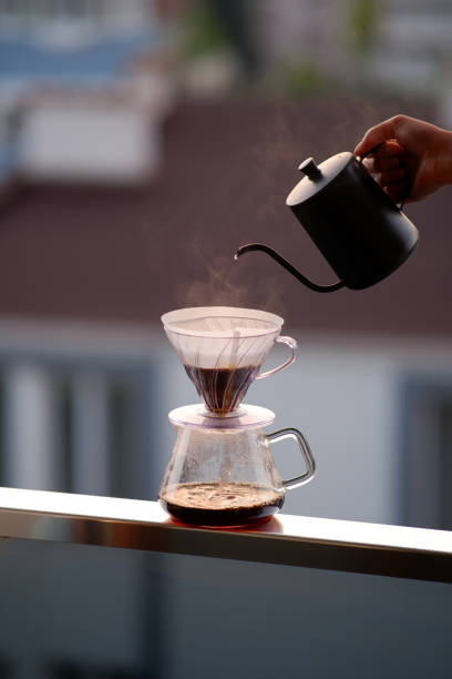 istock Brewing coffee on the balcony at sunrise 2153734546