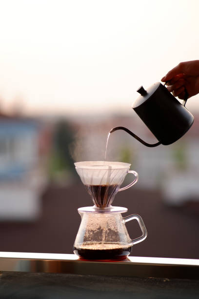 istock Brewing coffee on the balcony at sunrise 2153734548